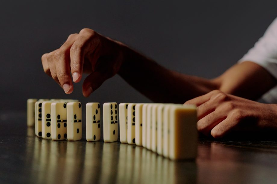 Stacking dominos.